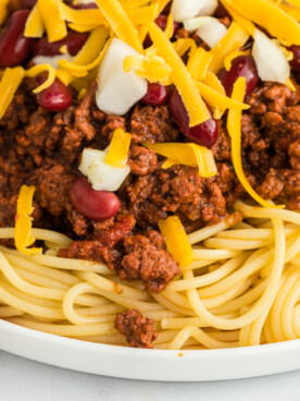 Close up up cincinnati chili on spaghetti.
